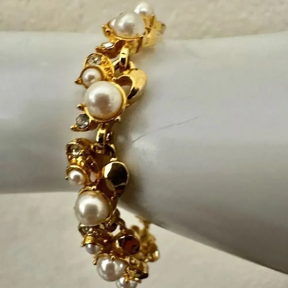 Gold tone faux pearl rhinestone bracelet